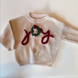 Cream Joy Sweater with Red and Green Accents